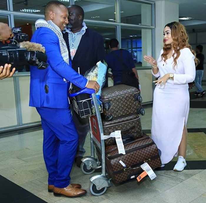 JK Kazoora and Johnnie Sempebwa receing Zari at the Entebbe International Airport
